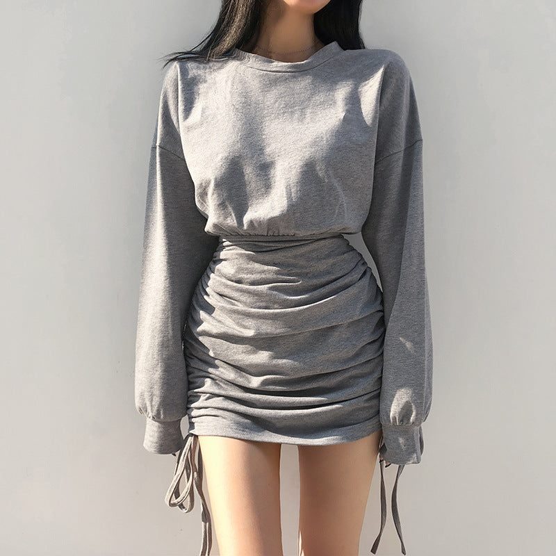 Stylish American athleisure sweater dress in grey with ruched sides and long sleeves