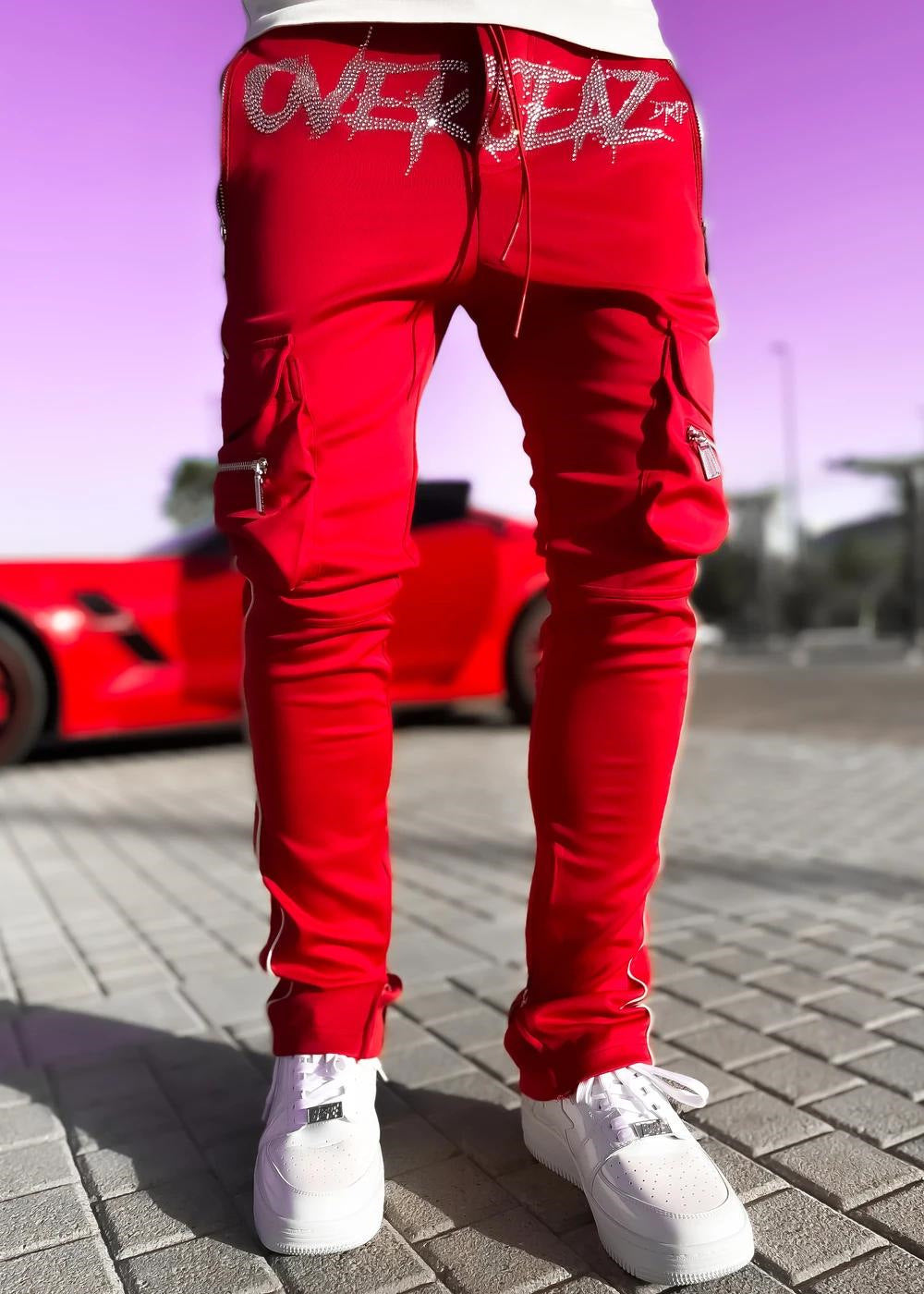 Red athleisure cargo pants with zipper pockets and stylish design for casual and sporty wear