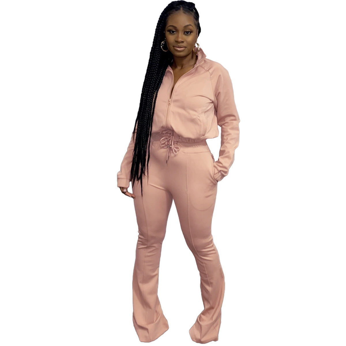 Stylish athleisure two piece set in soft pink featuring a zip-up hoodie and flared pants
