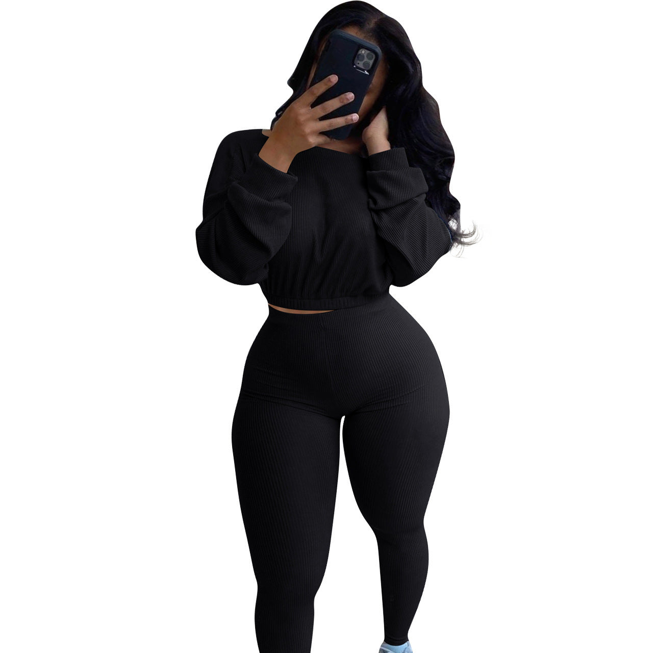 Black autumn ribbed athleisure suit with a cropped top and high-waisted leggings
