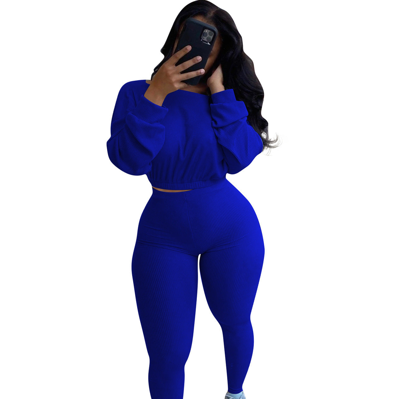 Stylish blue autumn ribbed athleisure suit featuring a cropped top and high-waisted leggings