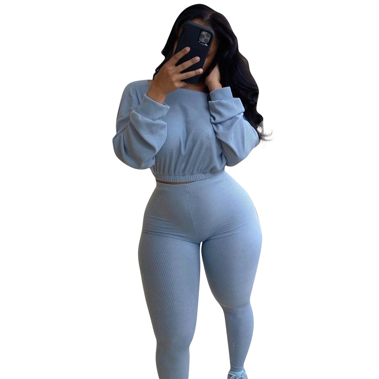 Stylish autumn ribbed athleisure suit in soft gray, perfect for casual outings and workouts