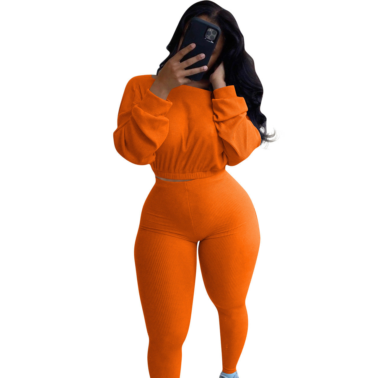 Trendy autumn ribbed athleisure suit in vibrant orange with fitted design for stylish comfort