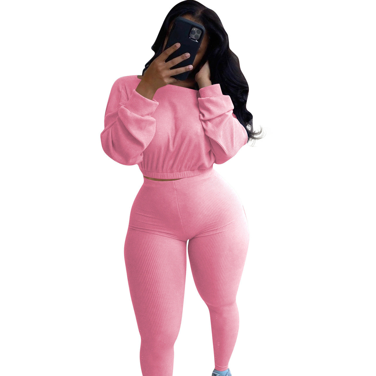 Stylish autumn ribbed athleisure suit in pink, perfect for casual wear and workouts