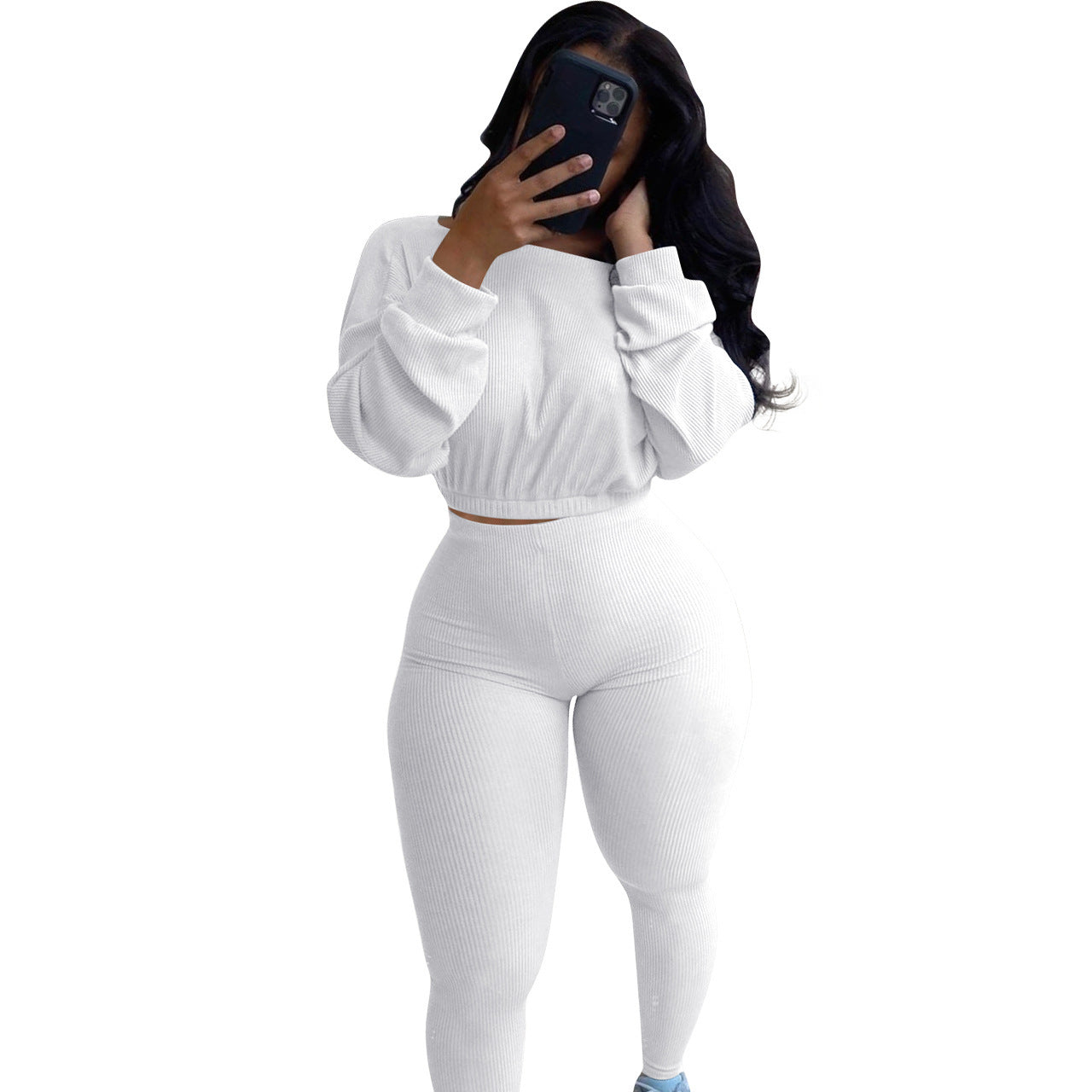 White autumn ribbed athleisure suit with a cropped top and form-fitting leggings for casual wear