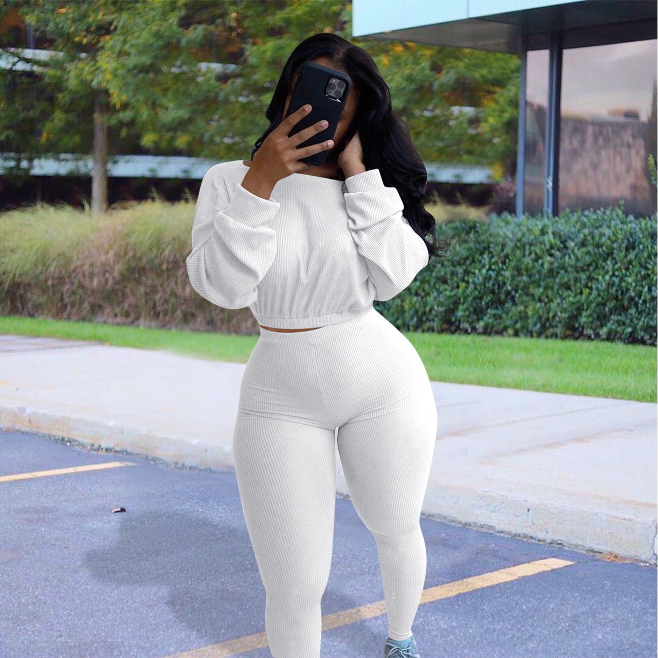 Stylish autumn ribbed athleisure suit in white, perfect for casual outings and workouts