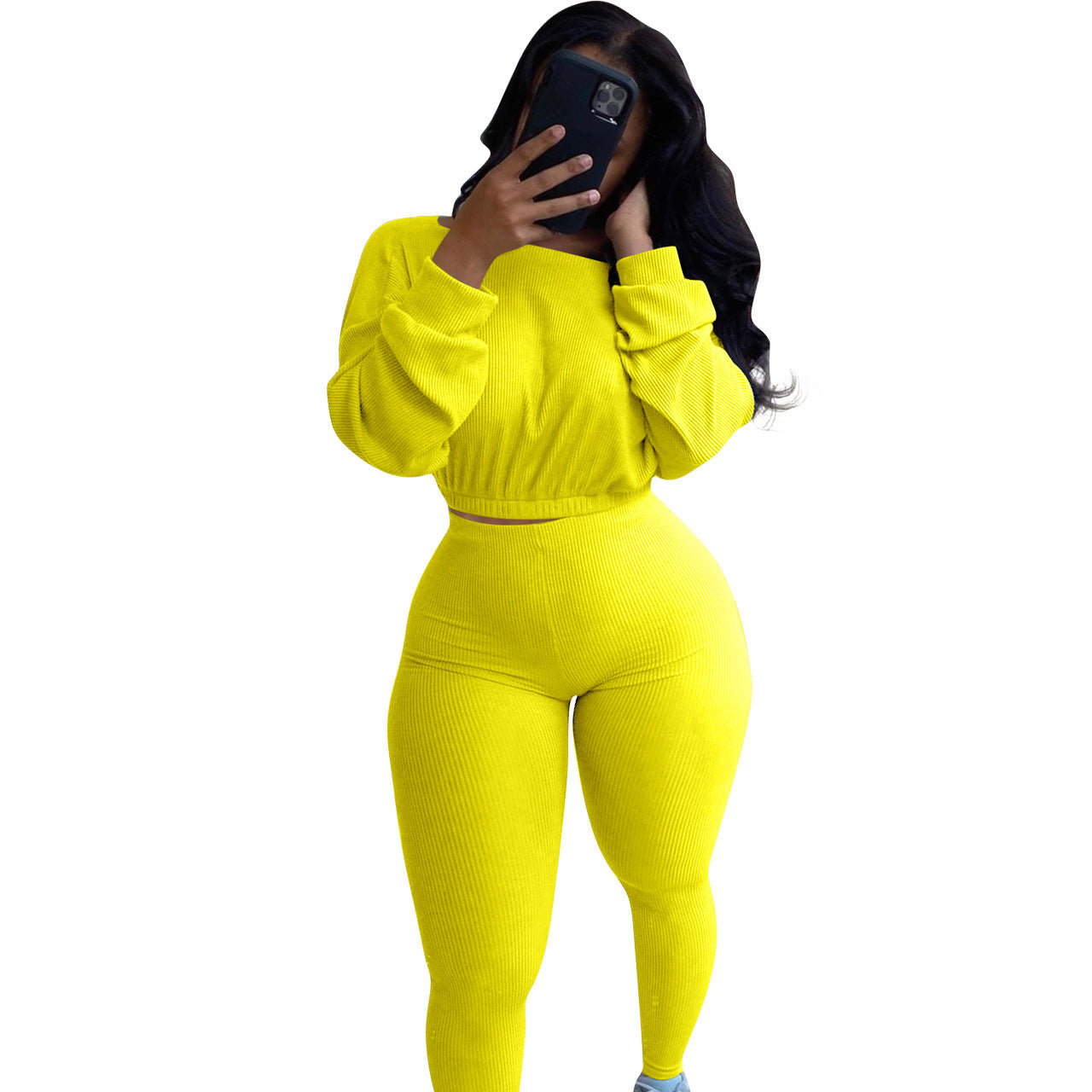 Bright yellow autumn ribbed athleisure suit featuring a cropped top and fitted leggings