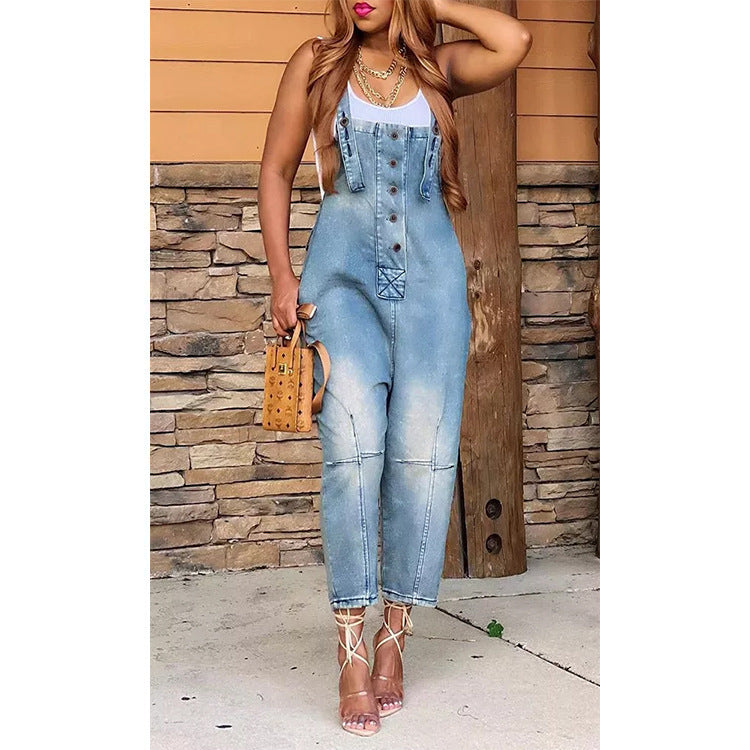 Stylish woman wearing casual fashion jeans overalls with a fitted top and strappy sandals