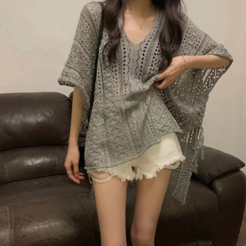 Chic loose smock top in grey with intricate lace details and relaxed fit, perfect for casual outings