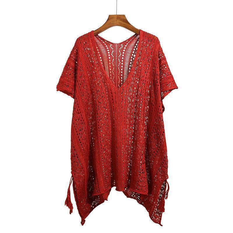 Chic loose smock top in vibrant red with intricate lace detailing and tie accents