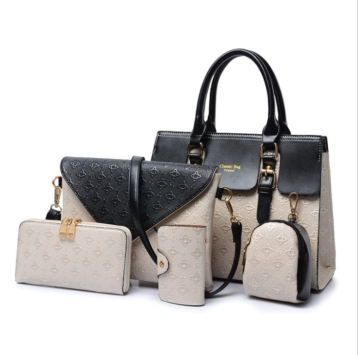 Luxury leather handbags set featuring a large tote, clutch, wallet, and coin purse in elegant design