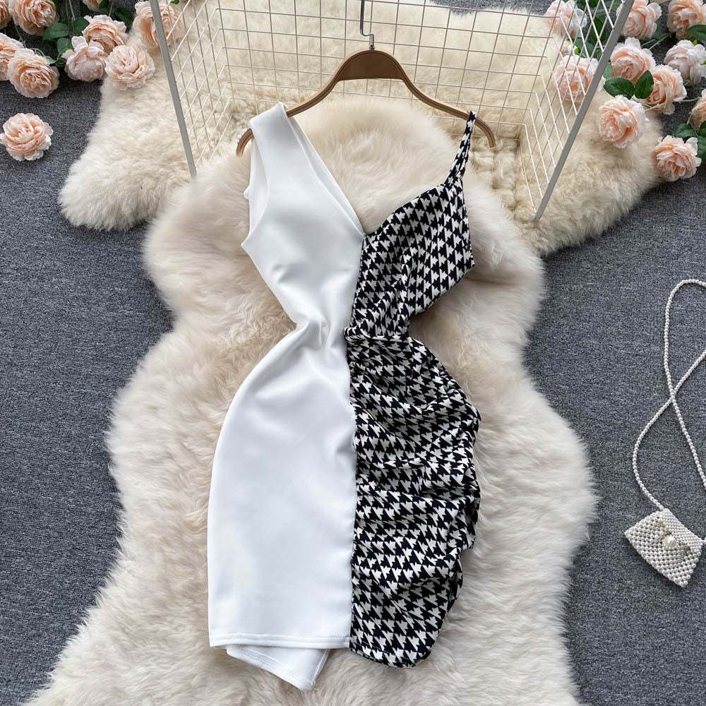 Stylish contrast panel slip dress featuring a white and houndstooth design for a trendy look
