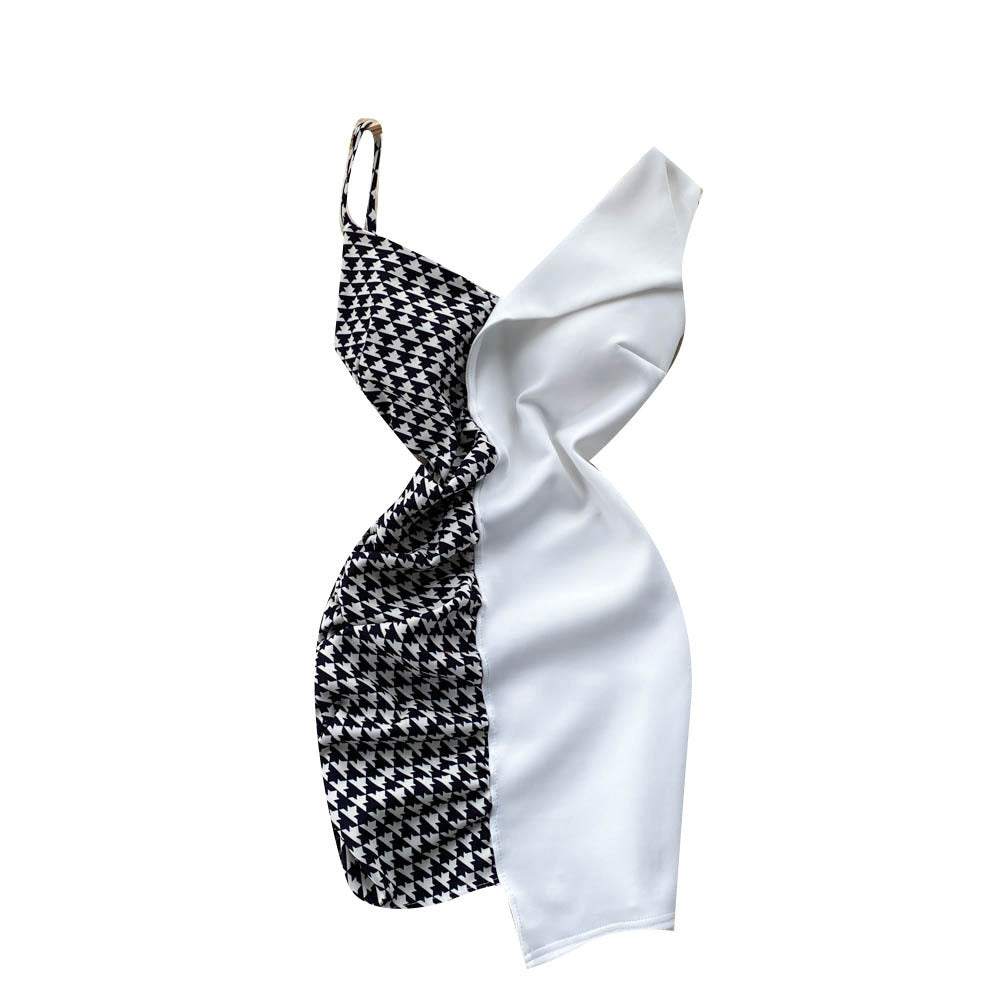 Stylish contrast panel slip dress featuring black and white houndstooth and solid fabric for elegant looks