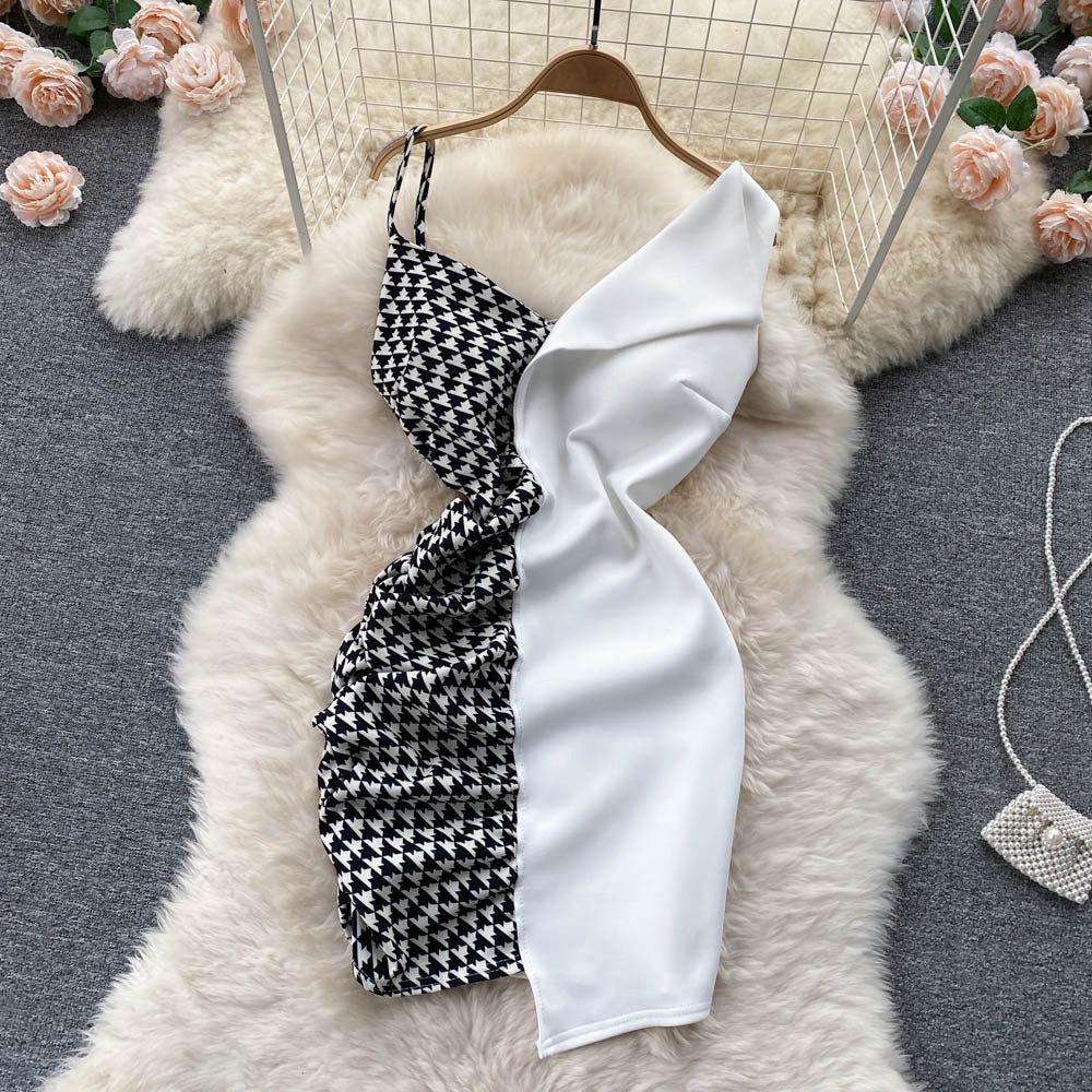 Stylish contrast panel slip dress in black and white houndstooth design, perfect for trendy occasions