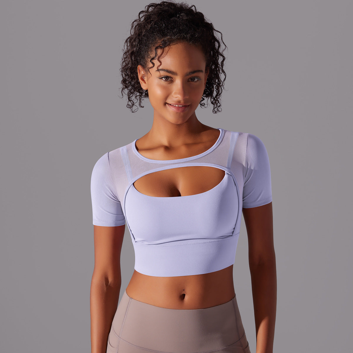Light purple double layer yoga top for women with stylish cut-out design and short sleeves