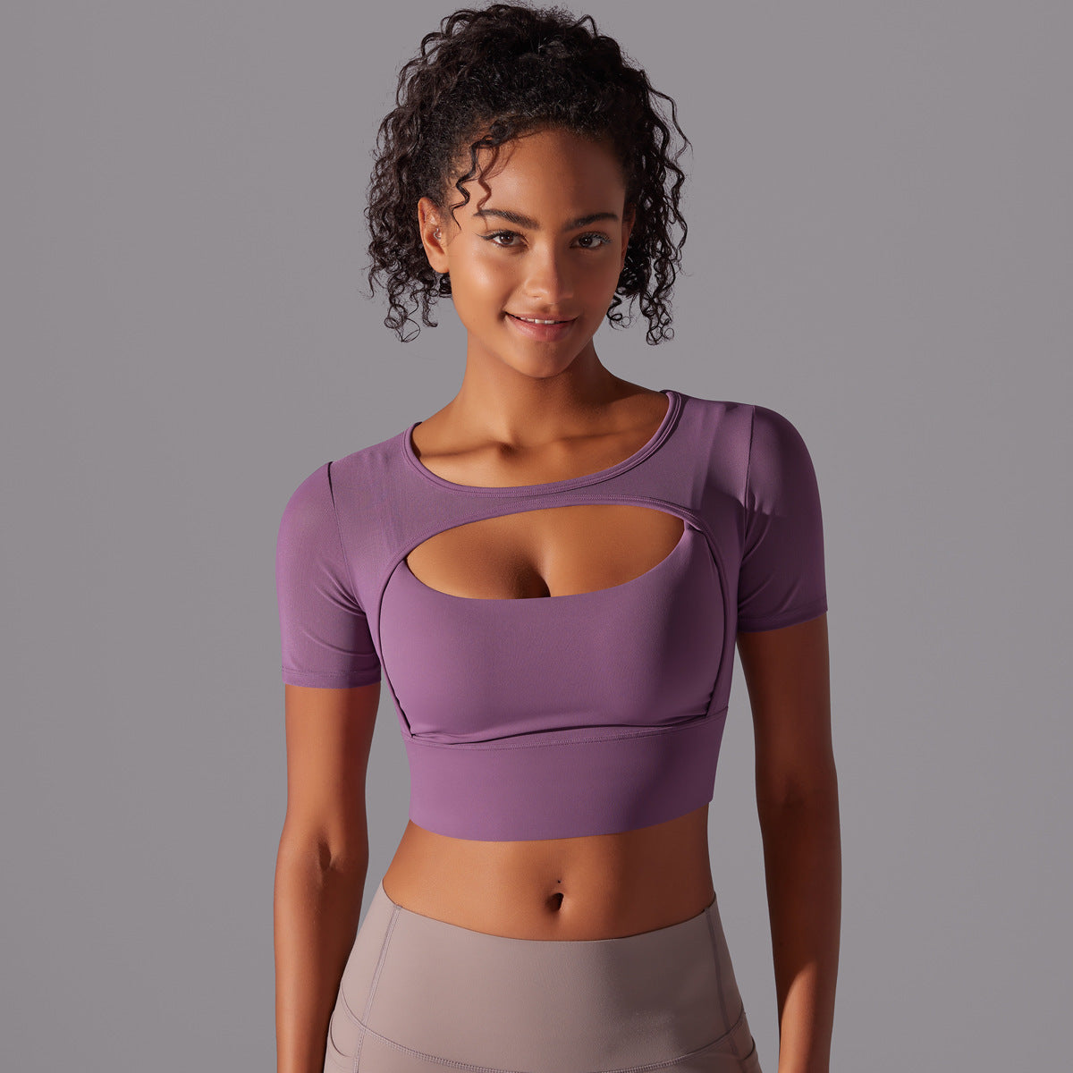 Stylish double layer yoga top for women in purple with a unique cut-out design