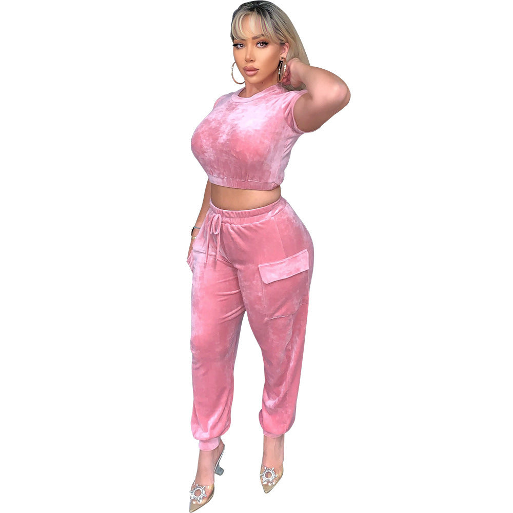 Stylish model wearing a pink athleisure set perfect for casual outings and workouts
