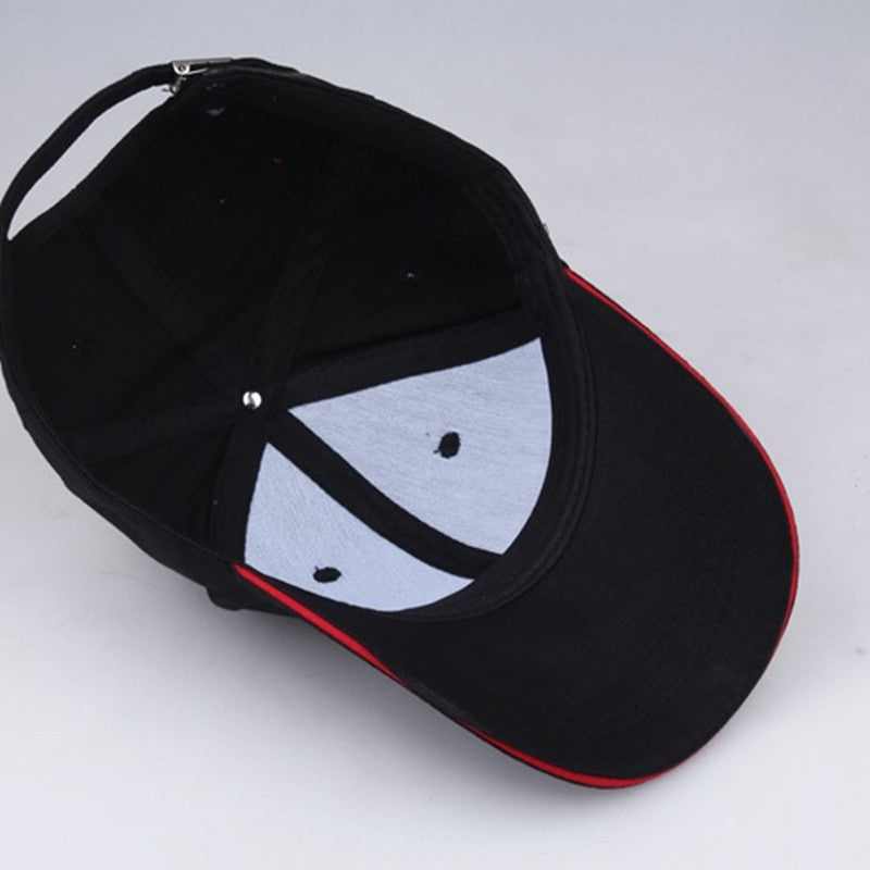Inside view of a black golf baseball hat with red trim and ventilation holes