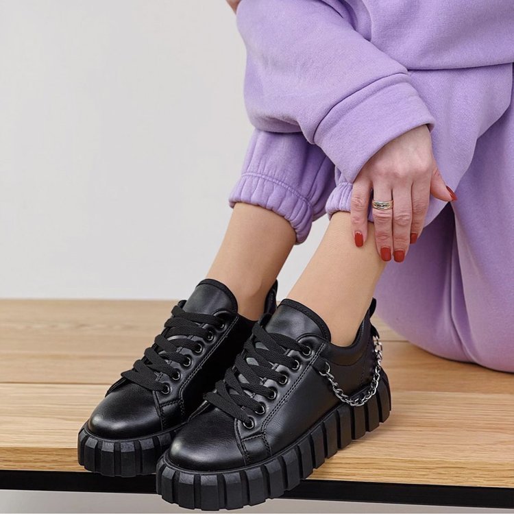 Stylish lace front platform sneakers in black with chunky sole and chain detail, perfect for trendy outfits
