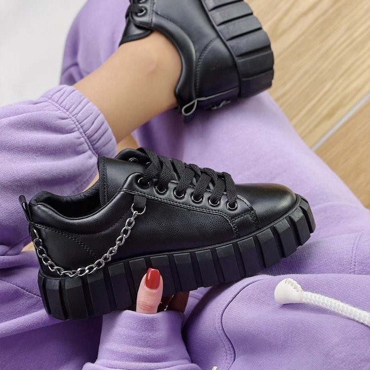 Stylish black lace front platform sneakers with a chunky sole and chain detailing