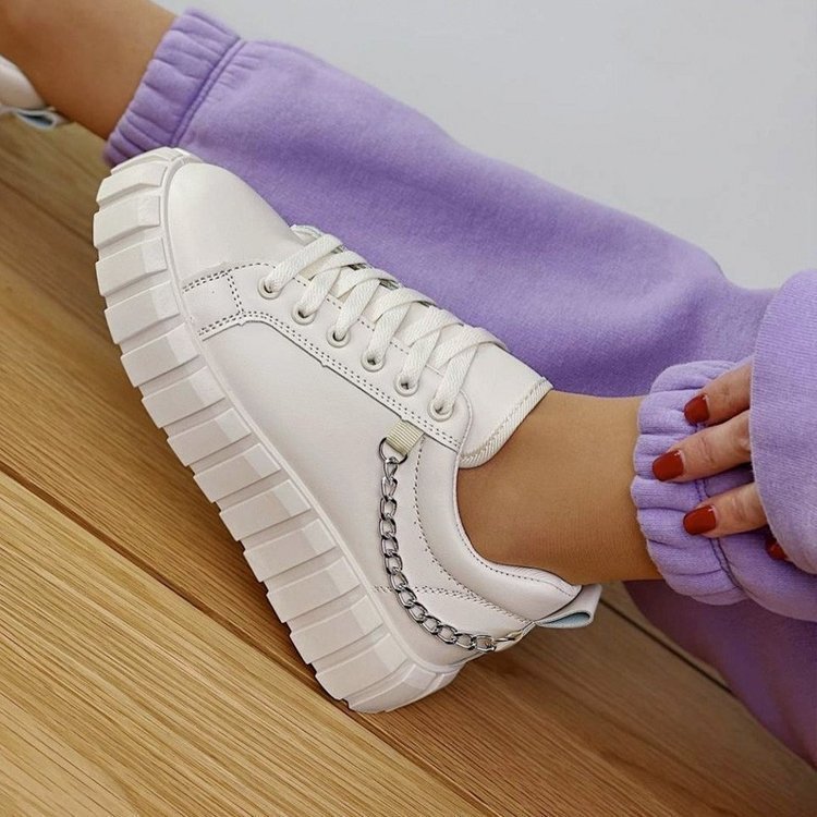 Stylish lace front platform sneakers in white with silver chain detail for a trendy look