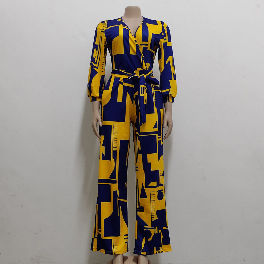Stylish long sleeve ladies jumpsuit in bold yellow and blue geometric pattern with belted waist