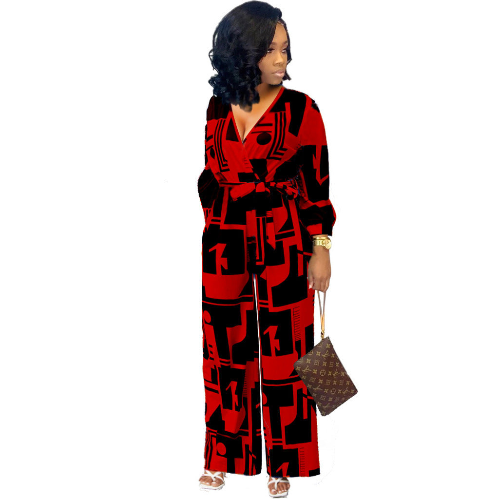 Stylish long sleeve ladies jumpsuit in red and black geometric print, perfect for casual outings or parties