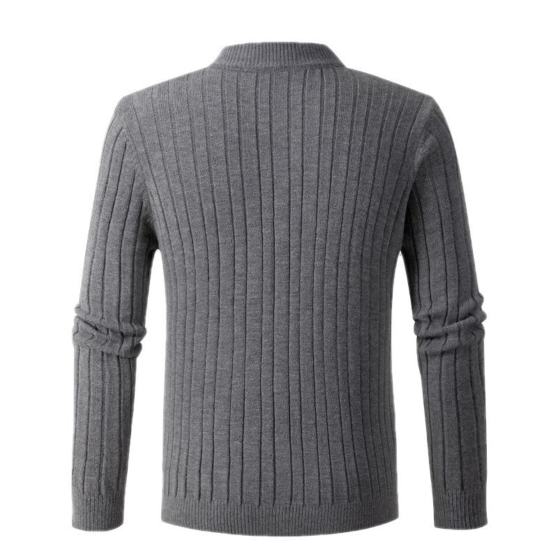 Back view of a gray long sleeve cable knit pullover featuring a ribbed texture for added warmth