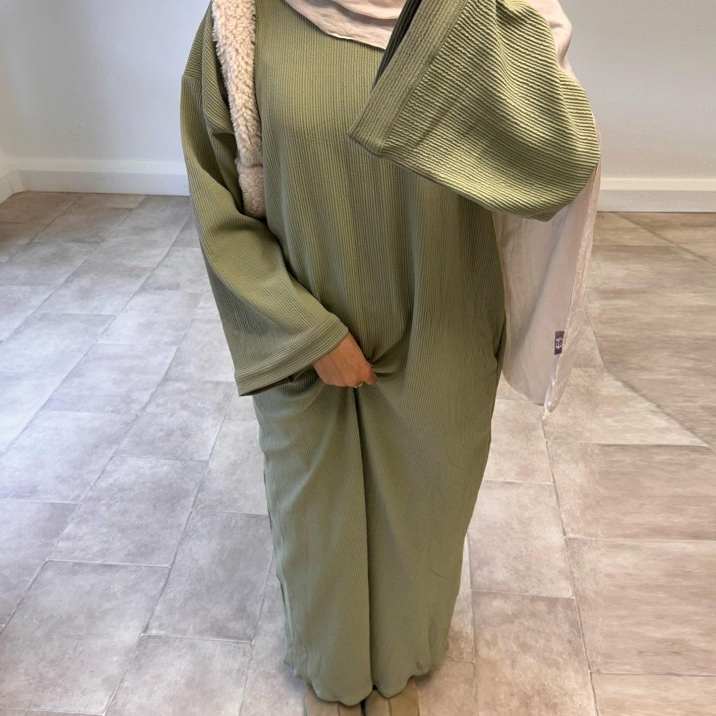 Comfortable loose leisure dress in soft green fabric, perfect for casual outings and everyday wear