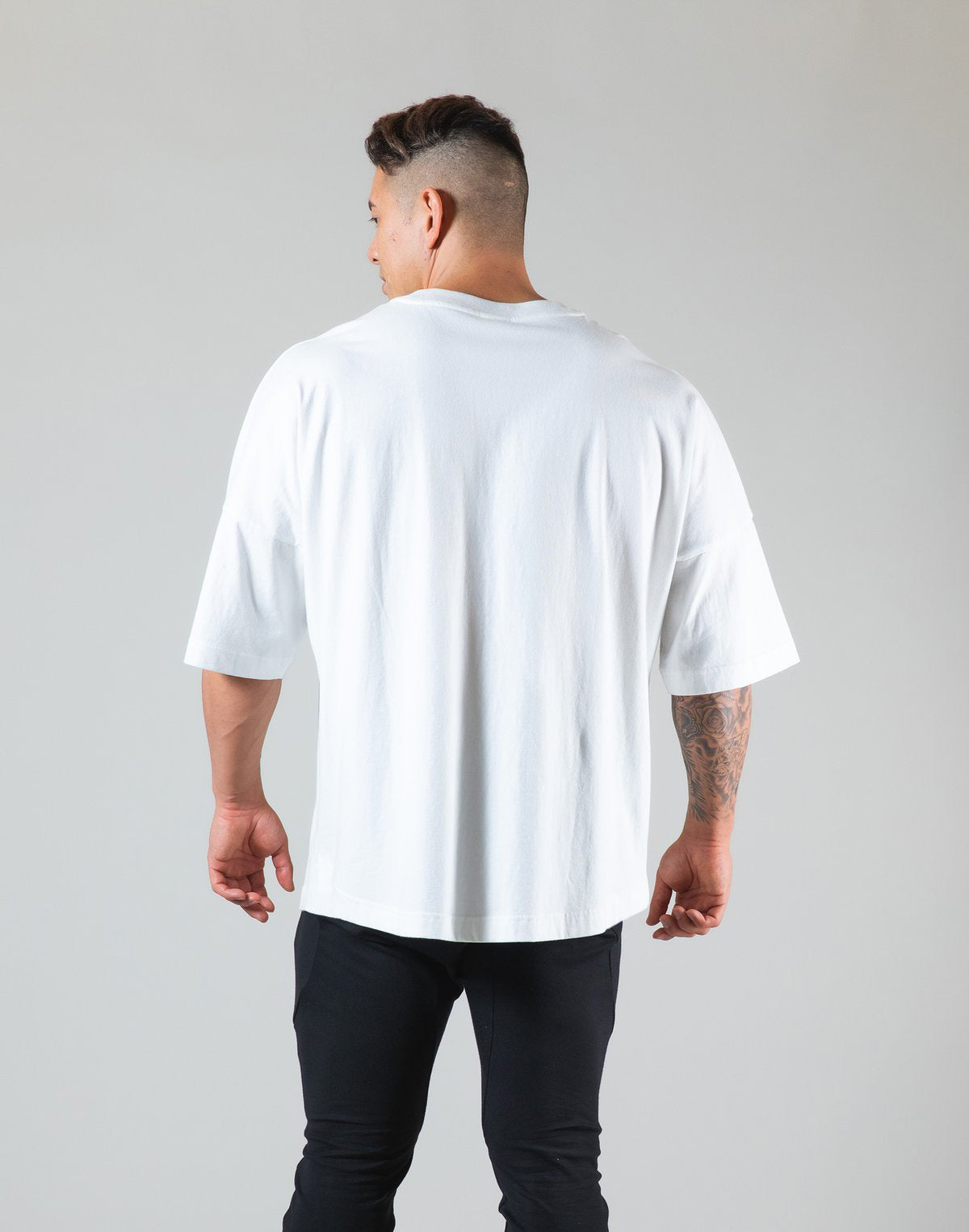 Men's white round neck athleisure shirt with relaxed fit and short sleeves from CJdroposhipping