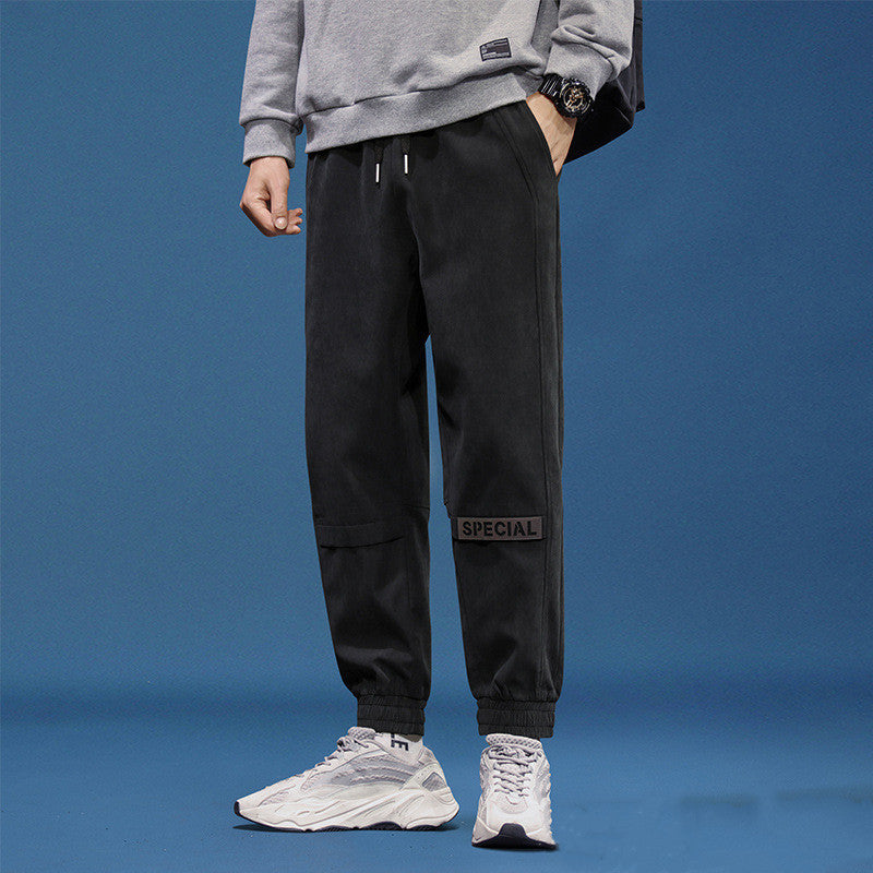 Men's reflective athleisure pants in black with a comfortable fit for active lifestyles