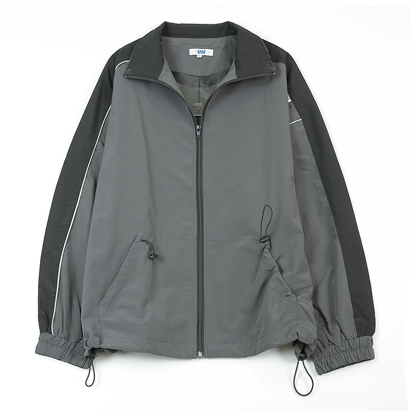 Men's reflective athleisure two piece set featuring a lightweight jacket with adjustable cuffs