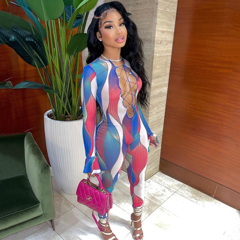 Stylish mesh sheer long sleeve jumpsuit with colorful pattern, perfect for fashionable outings