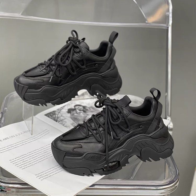 Stylish black platform athleisure shoes with thick soles and adjustable laces for casual wear