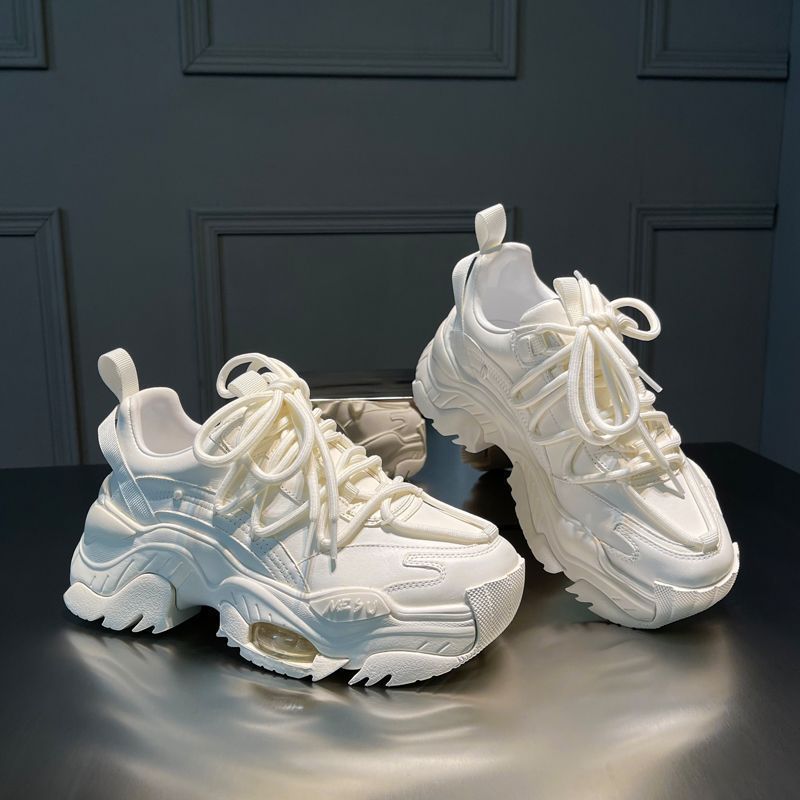 Stylish white platform athleisure shoes with thick soles and lace-up design for casual wear