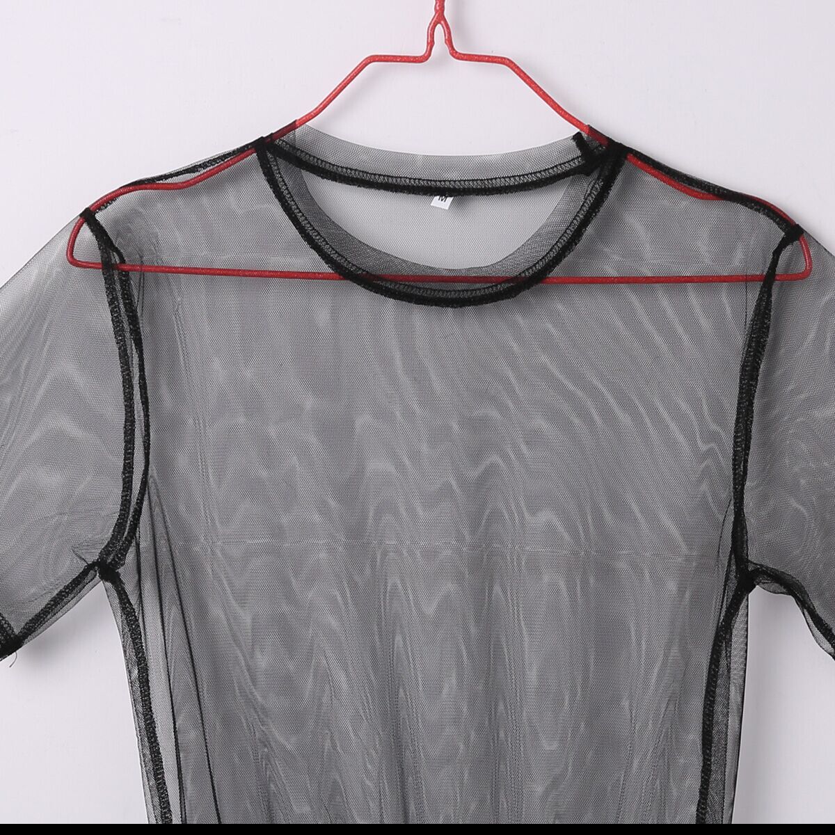 Black sheer mesh work clothes featuring a simple, elegant design for a stylish professional look