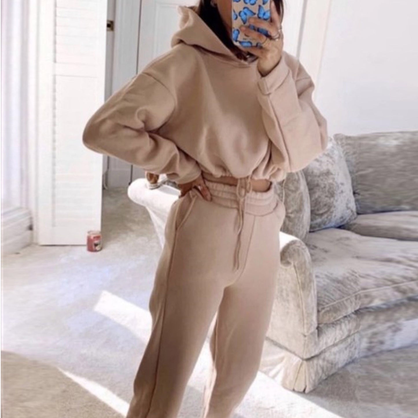 Beige 2 piece sports outfit for women featuring a comfortable hoodie and matching joggers