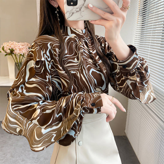 Stylish chic ruffle top for women in abstract brown pattern with long sleeves