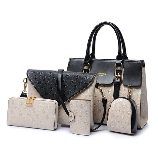 Luxury leather handbags set featuring a large tote, clutch, wallet, and coin purse in elegant design