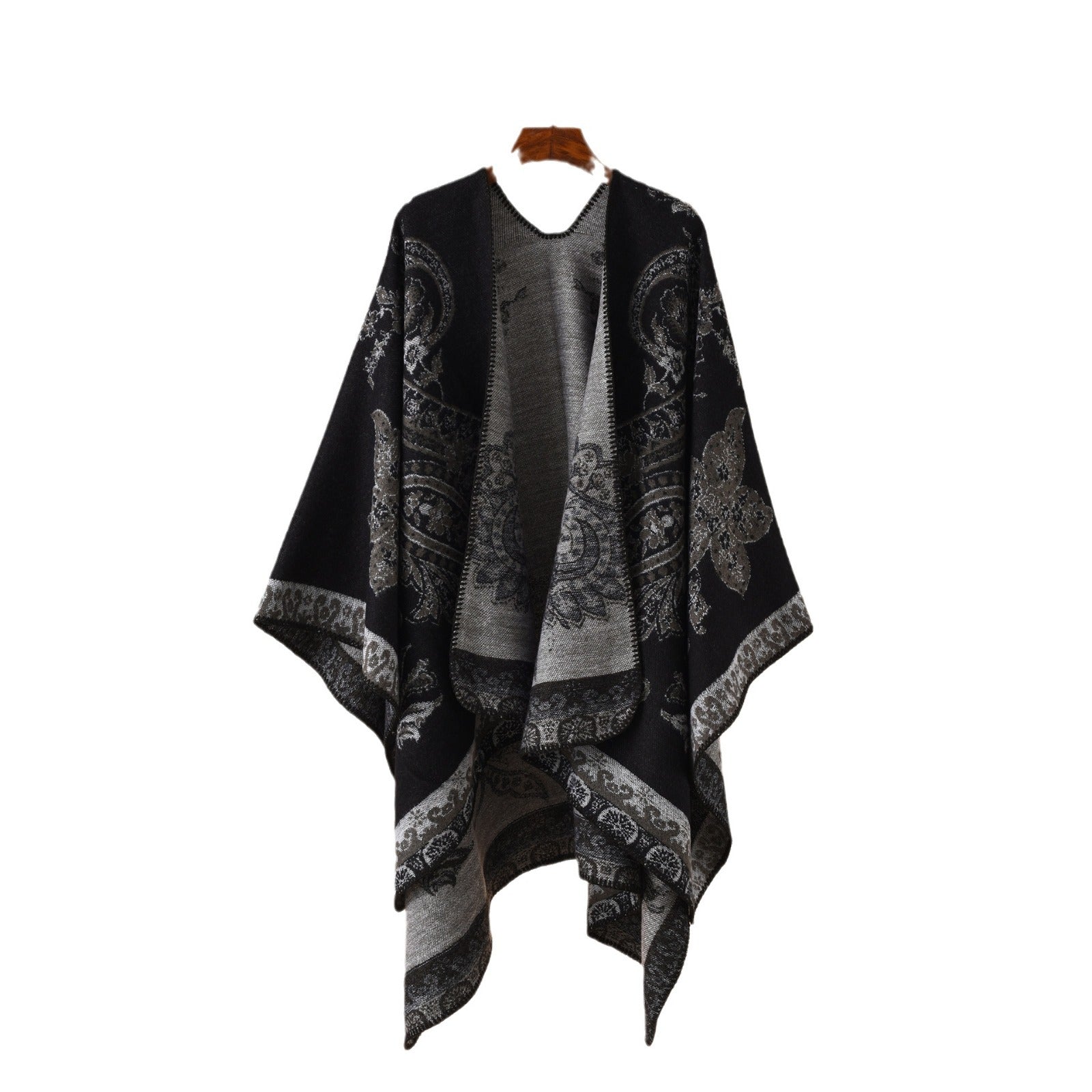 Elegant winter talma with intricate patterns, perfect for stylish layering in cold weather