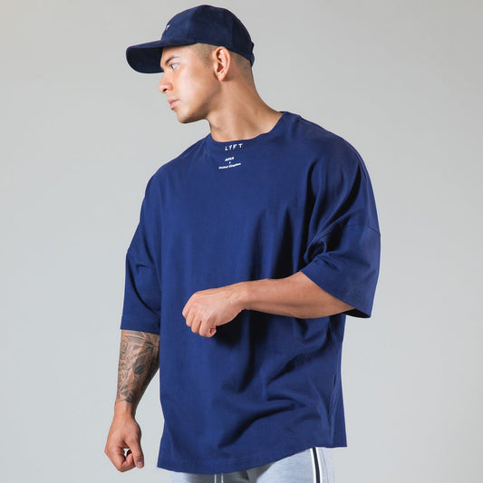 Navy round neck athleisure shirt with short sleeves for casual and sporty wear
