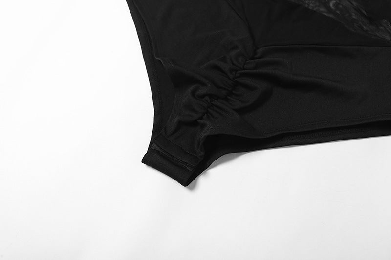 Close-up of the sleeve detail on a mesh contrast bodysuit for a stylish look