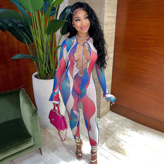 Colorful mesh sheer long sleeve jumpsuit featuring a lace-up front and form-fitting design